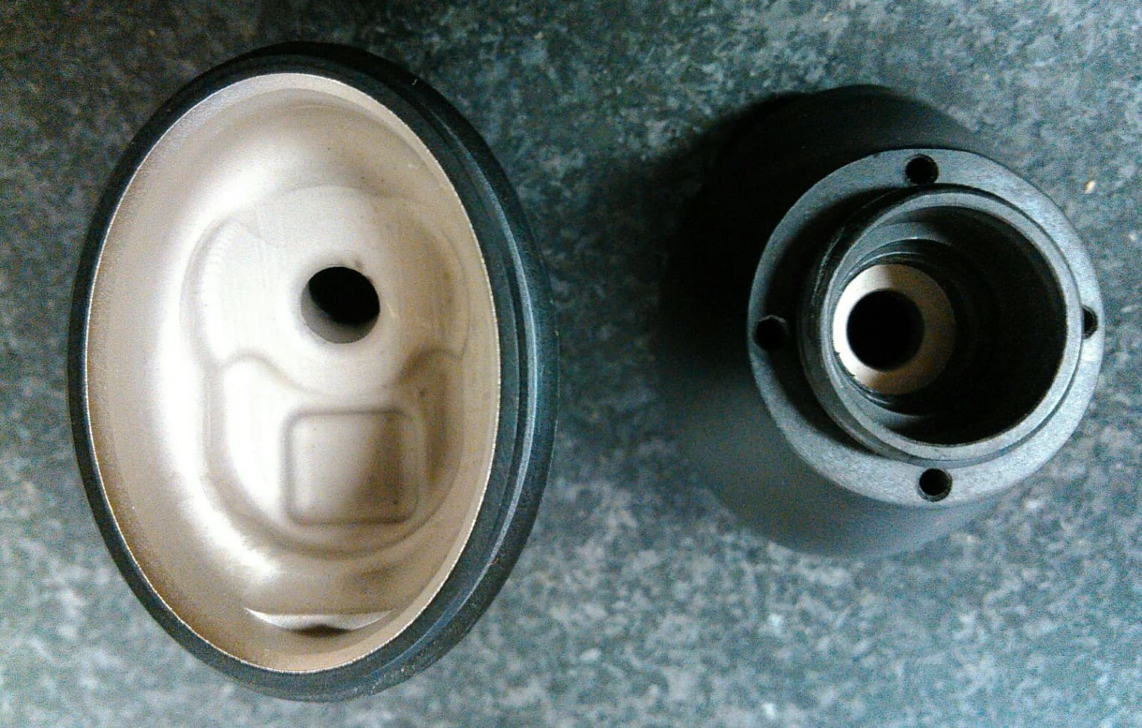 Two-part machined body with polished pocket and threaded boss