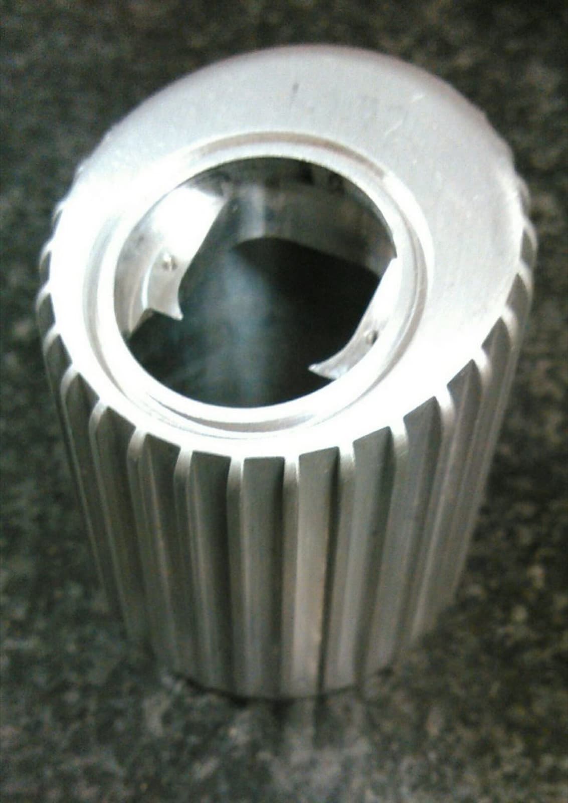 Finned aluminum housing turned and milled with internal bore